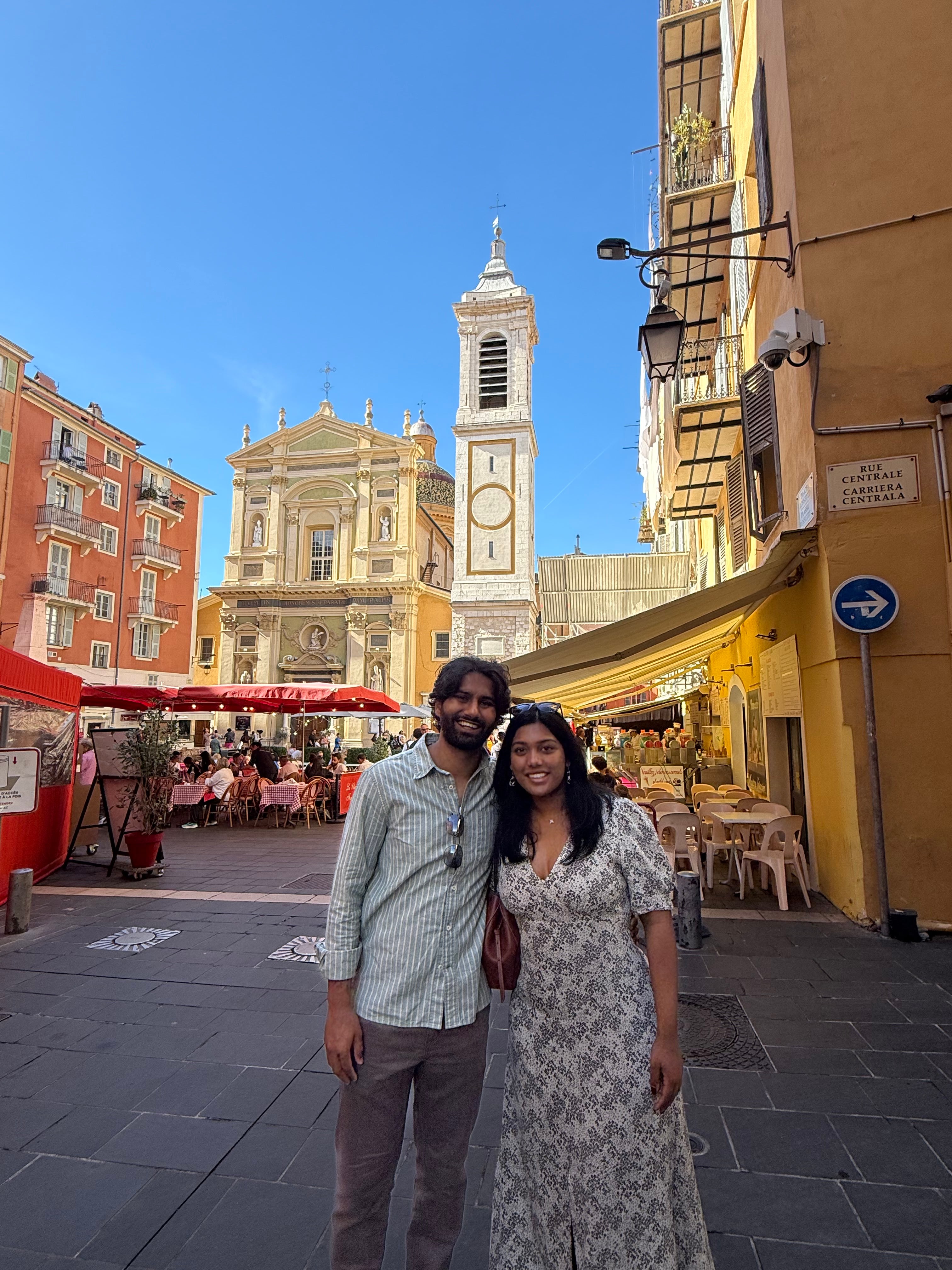 Esha and Anish standing together in Nice on the French Riviera